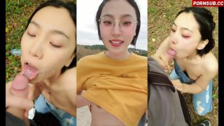 Asian Girl with Glasses Gives blowjob in the Woods